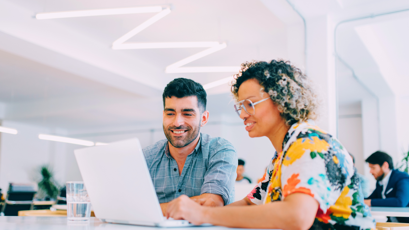 Adult students exploring career training opportunities online through Pinnacle Career Institute trade school programs in Missouri