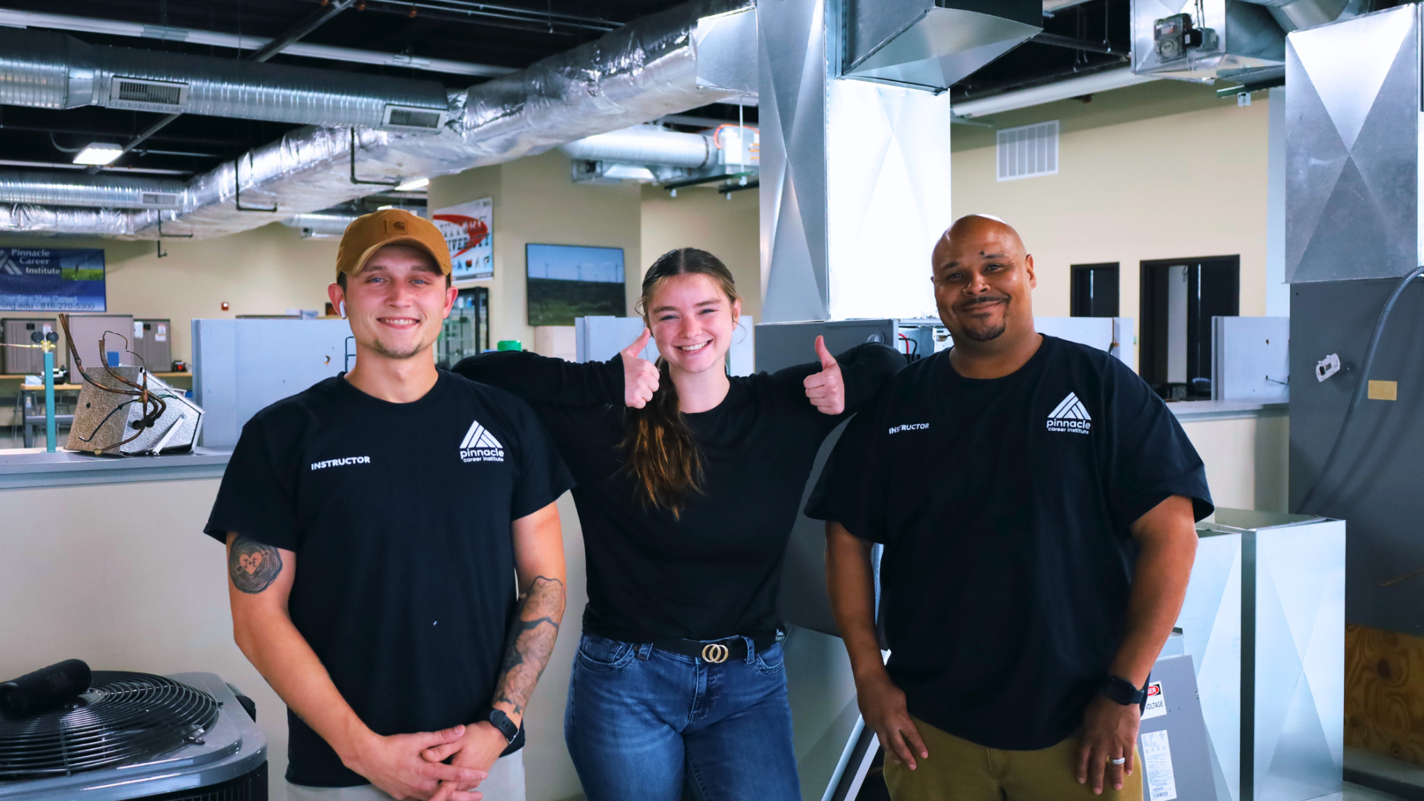 HVAC technician students training in hands-on lab at Pinnacle Career Institute trade school in Kansas City Missouri