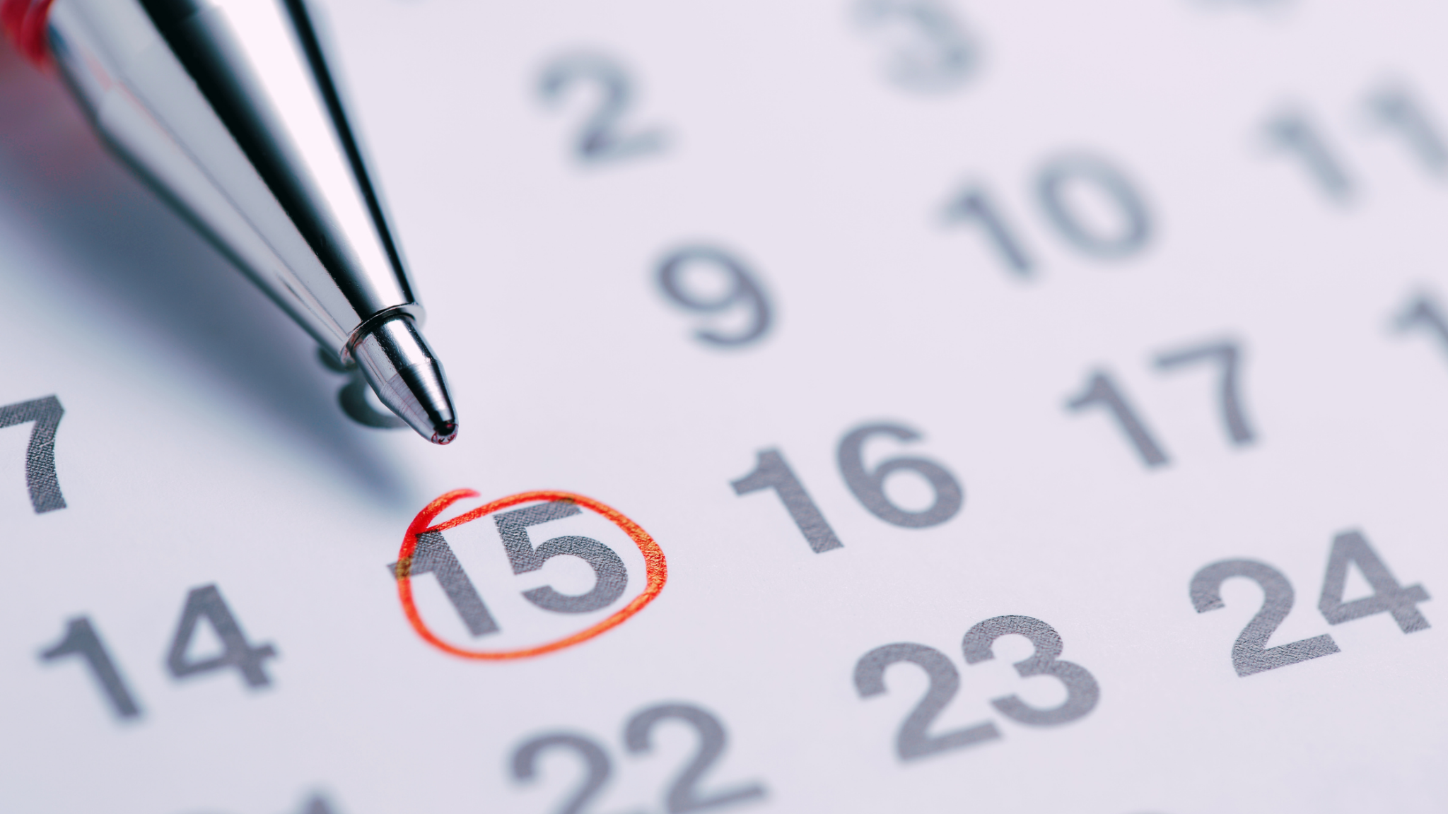 Pen pointing to a circled date on a calendar, representing weekly goals during technical training.
