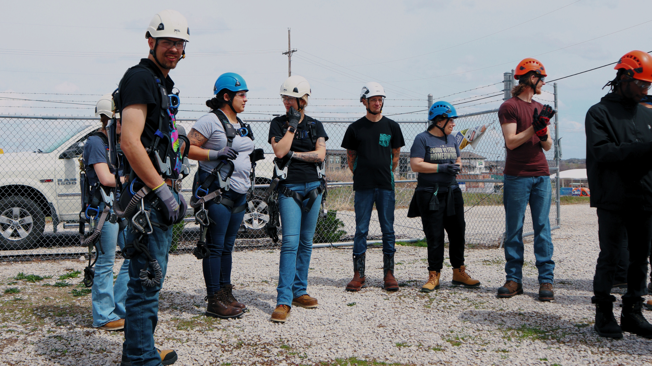 Wind turbine technician and tower technician students at Pinnacle Career Institute's outdoor climbing lab in Kansas City Missouri