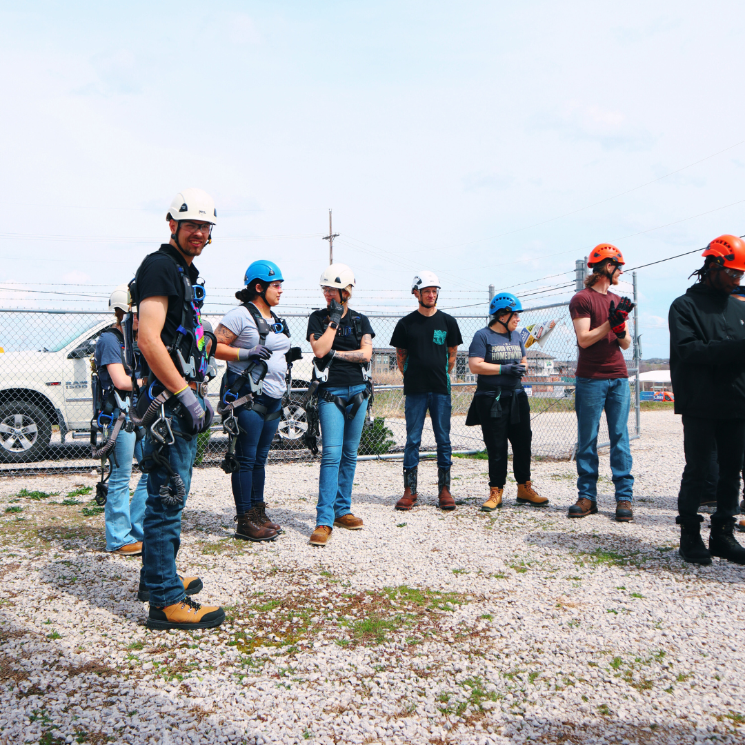 Pinnacle Career Institute students preparing to practice controlled descent